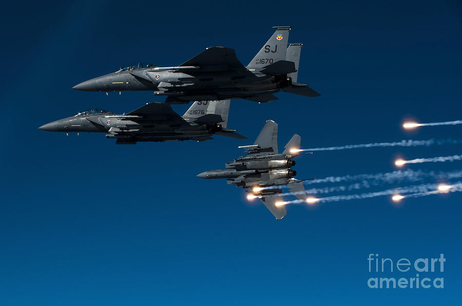 Airplane Photograph - A F-15e Strike Eagle Aircraft Releases #1 by Stocktrek Images