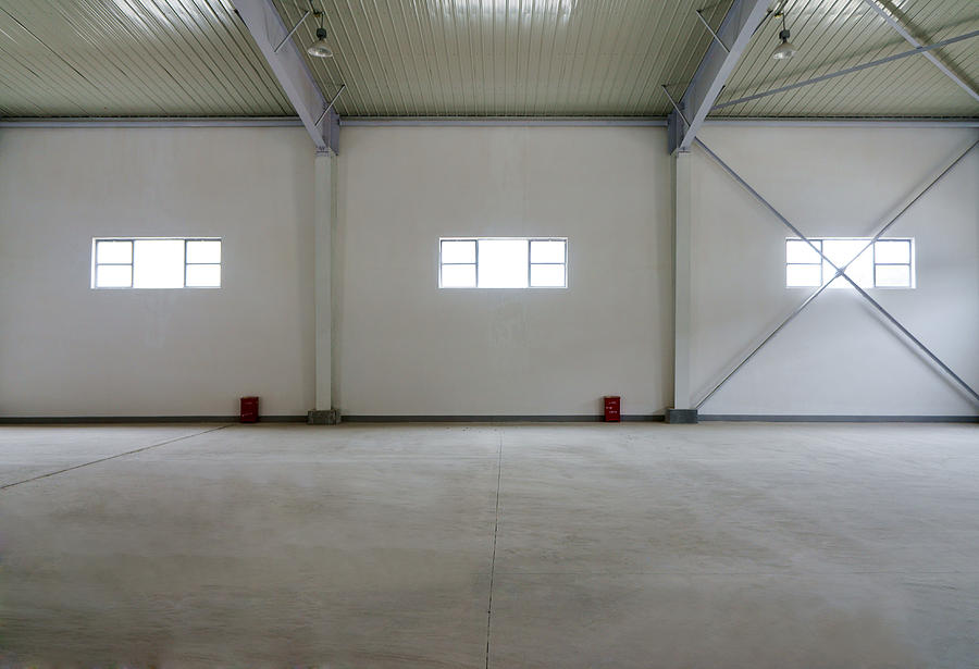 A Large Empty Warehouse  Or Covered Photograph by Guang Ho Zhu