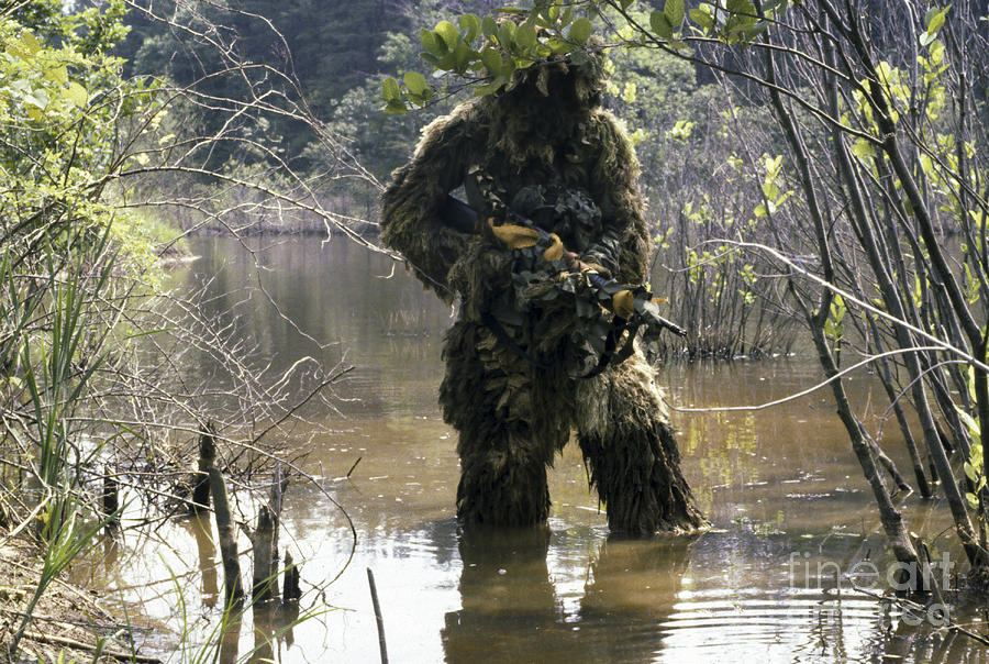 A Sniper Dressed In A Ghillie Suit #1 Photograph by Stocktrek Images