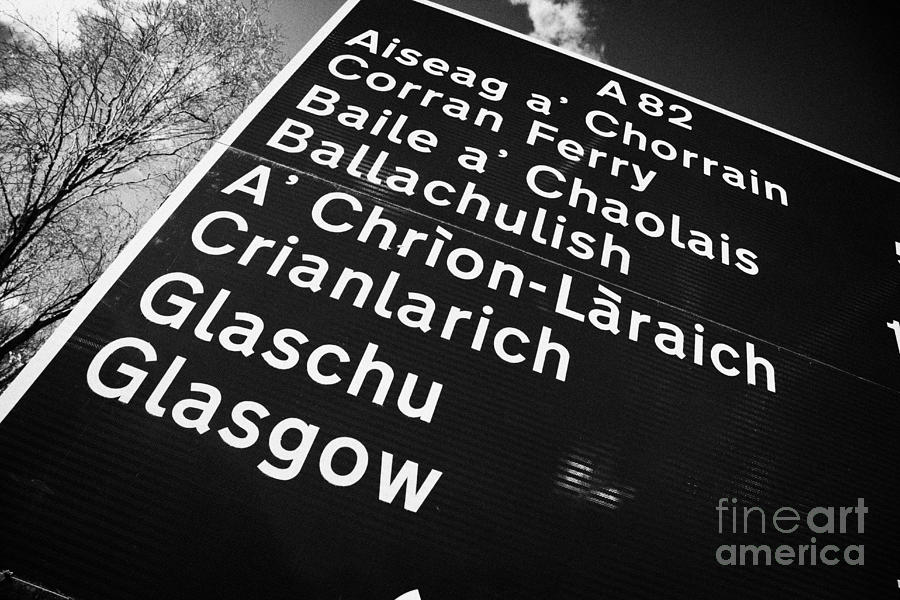 Sign Photograph - A82 bi-lingual scottish gaelic english roadsign for glasgow glaschu Scotland uk #1 by Joe Fox