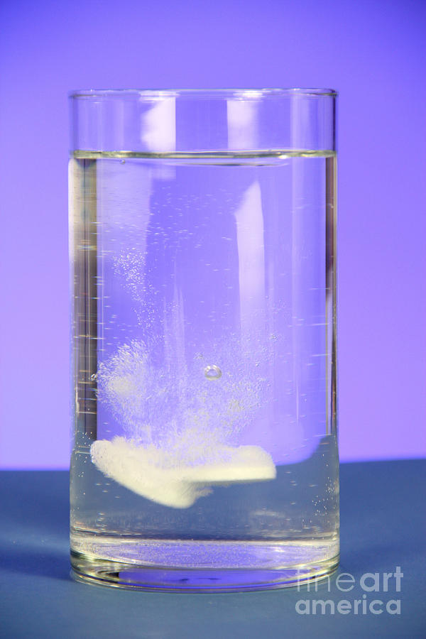Alka-seltzer Dissolving In Water #1 Photograph by Photo Researchers, Inc.
