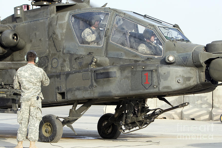 An Ah-64 Apache Prepares To Leave Photograph