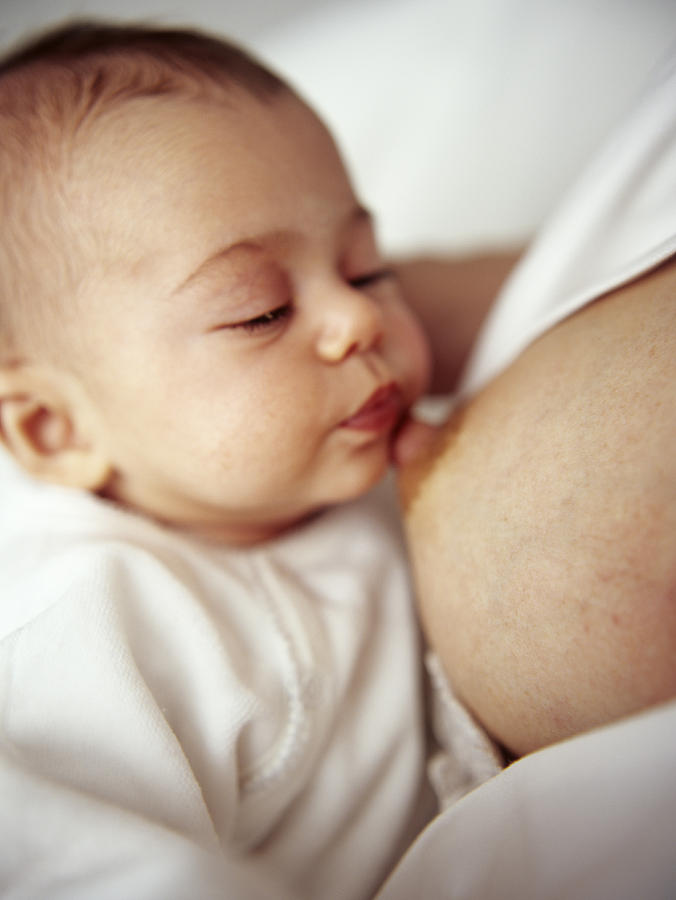 Breast Photograph - Baby Girl Breastfeeding #1 by Ian Boddy