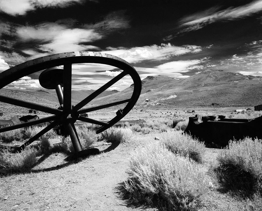 Black And White Photograph - Big Wheel Bodie #1 by Jan W Faul