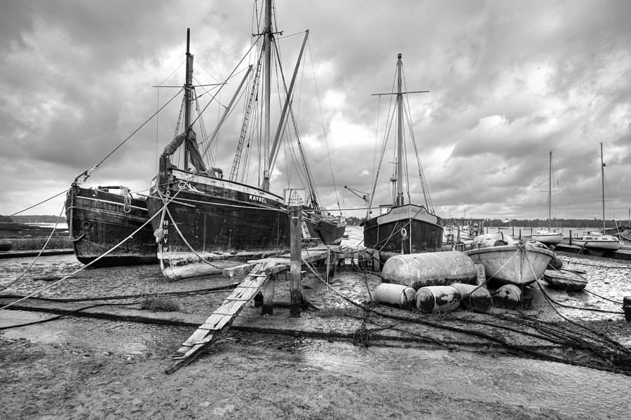 Boats on the hard Pin Mill Photograph by Gary Eason