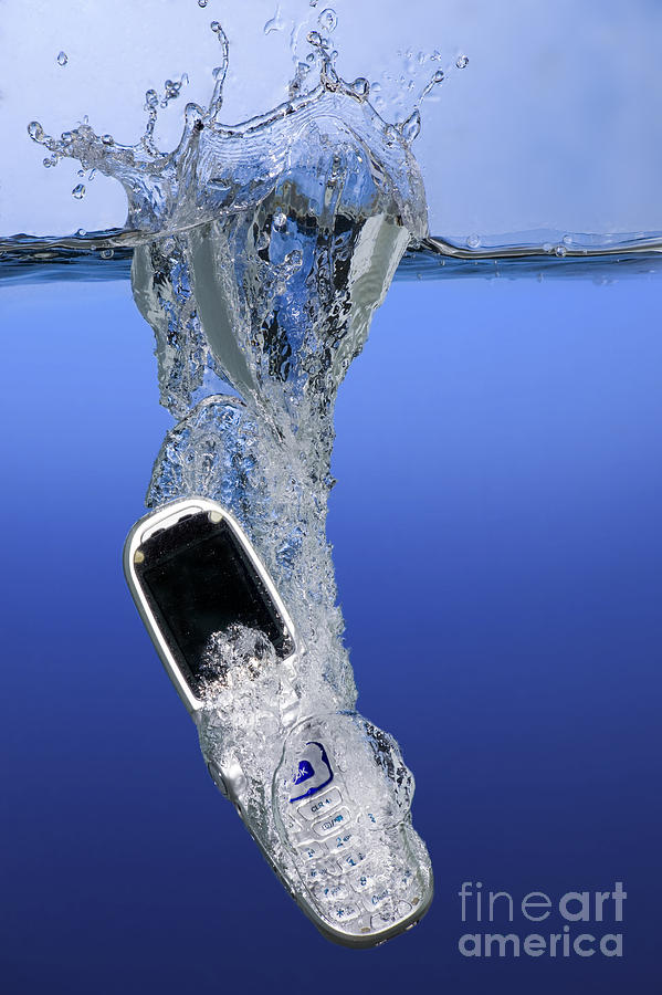 Cell Phone Dropped In Water #1 Photograph by Ted Kinsman