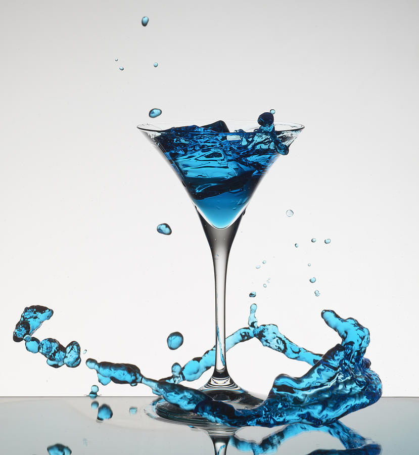 Cocktail Splashing Around Martini Glass #1 Photograph by Walter Zerla