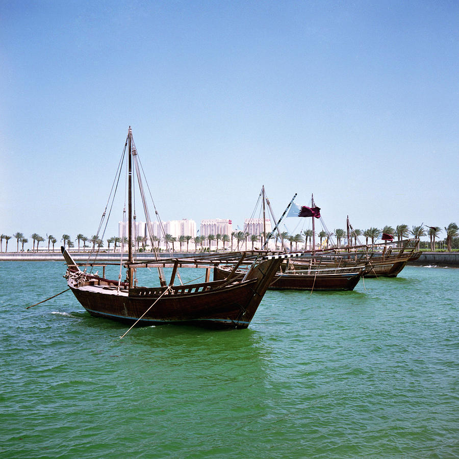 Dhows in Doha Bay #1 Photograph by Paul Cowan