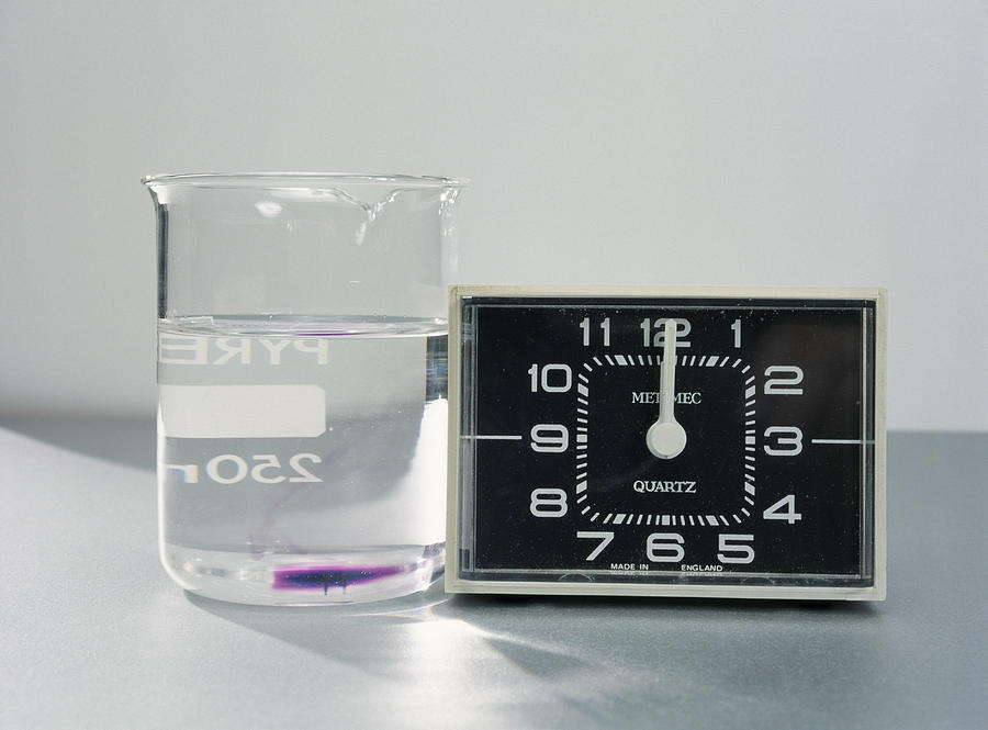 Clock Photograph - Diffusion Of Potassium Permanganate #1 by Andrew Lambert Photography