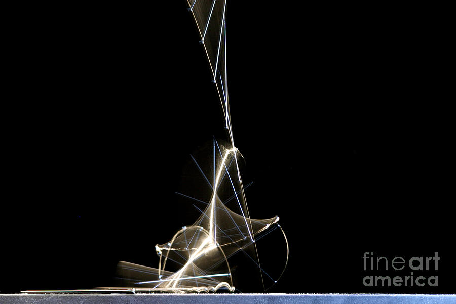 High Speed Strobe Image Of Pin Dropping #1 Photograph by Ted Kinsman