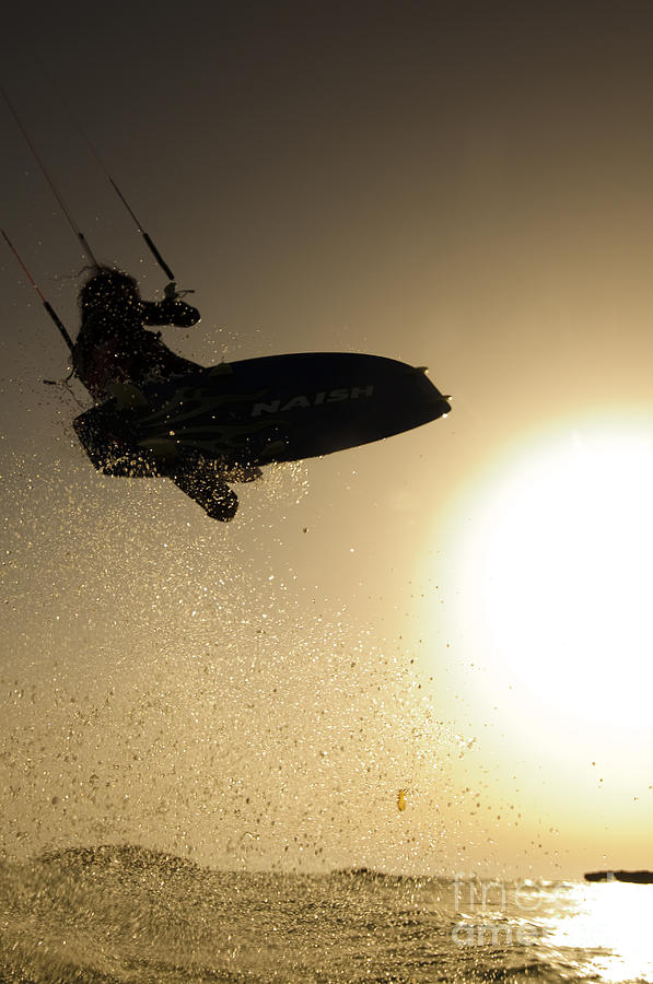 Kitesurfing at sunset #1 Photograph by Hagai Nativ