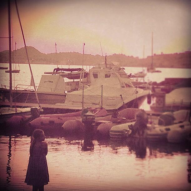 Sunset Photograph - Little Girl In Little Harbour. Elba #1 by Ilaria Agostini