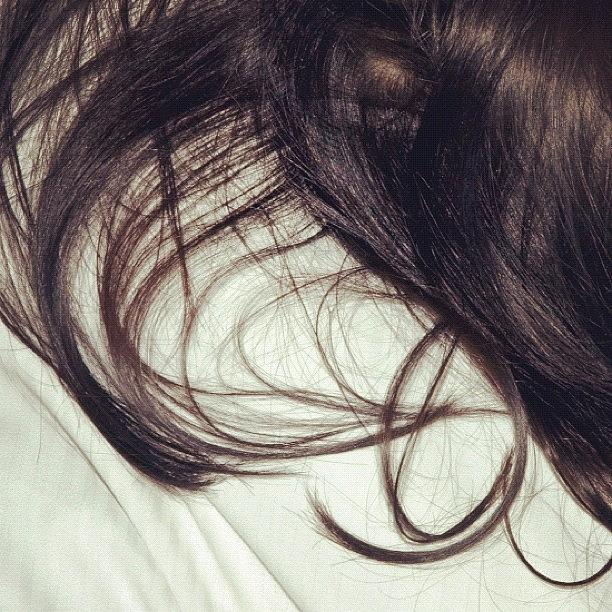 Bed Photograph - Long dark hair of a woman on white pillow #1 by Matthias Hauser