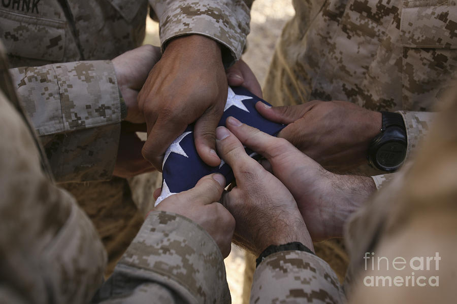 Marines Fold An American Flag #1 Photograph by Stocktrek Images