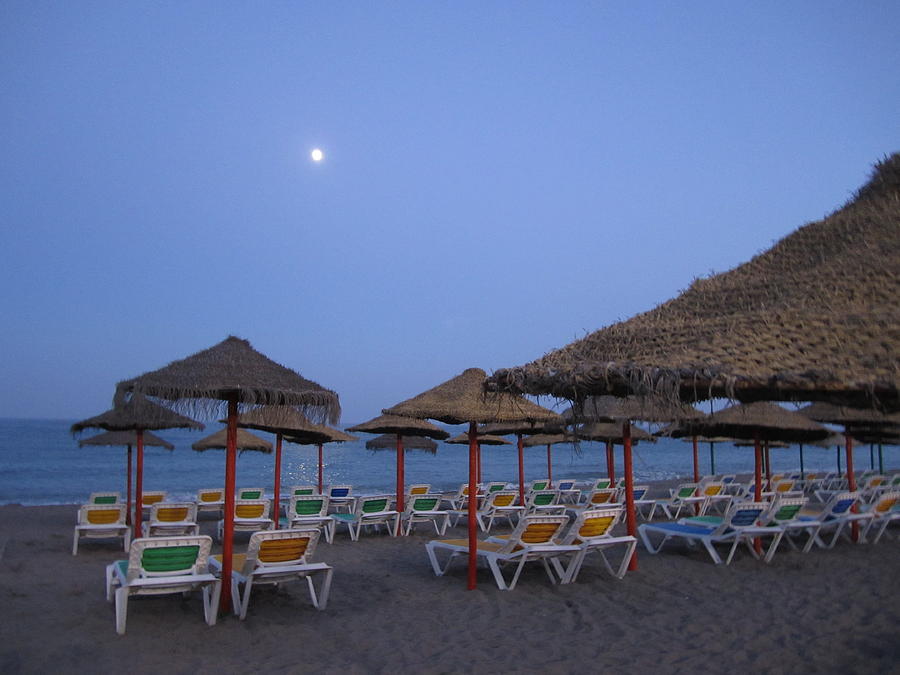 Moon Light Beach Umbrellas and Chairs Costa Del Sol Spain #1 Photograph by John Shiron