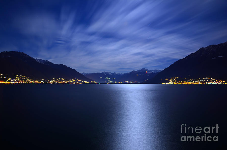 Moon light over an alpine lake #1 Photograph by Mats Silvan