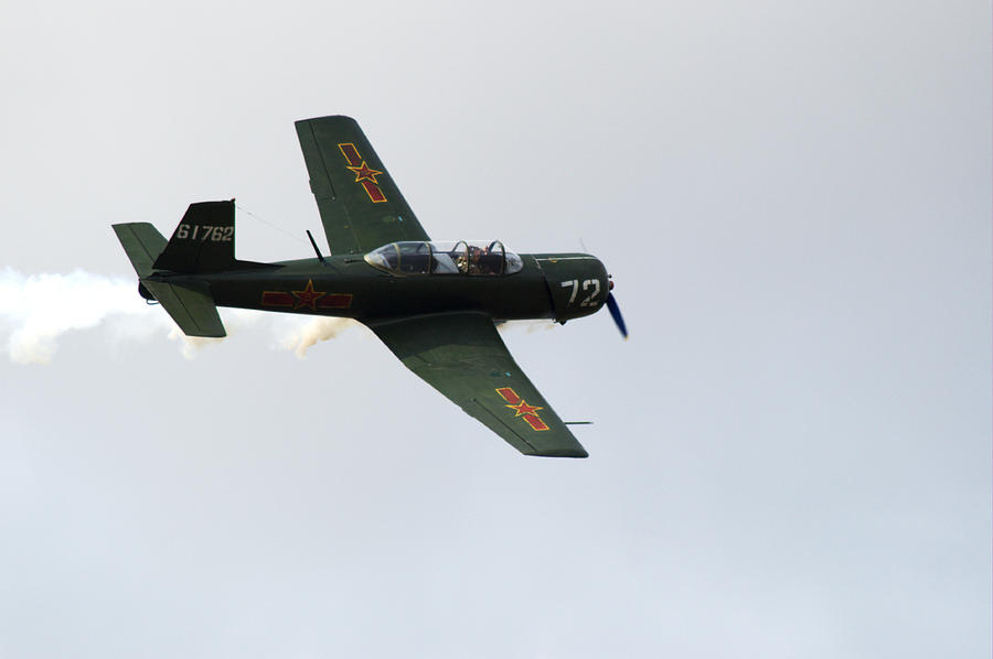 Nanchang CJ6 fighter in flight #1 Photograph by Chris Day