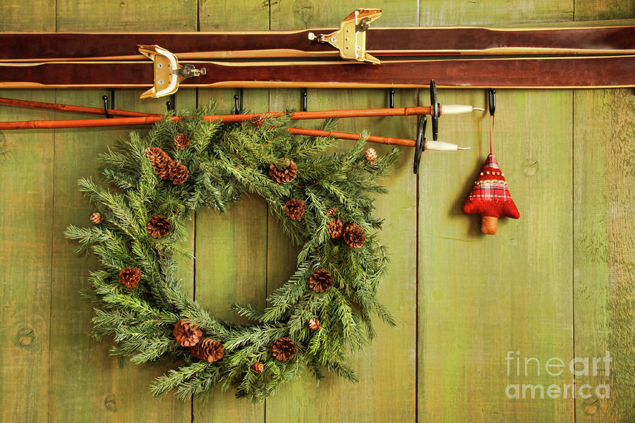 Christmas Photograph - Old pair of skis hanging with wreath #1 by Sandra Cunningham