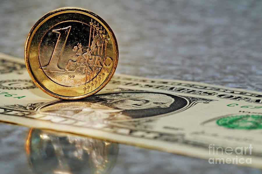 One Euro Coin Standing Up On US Dollar Banknote Photograph By Sami 