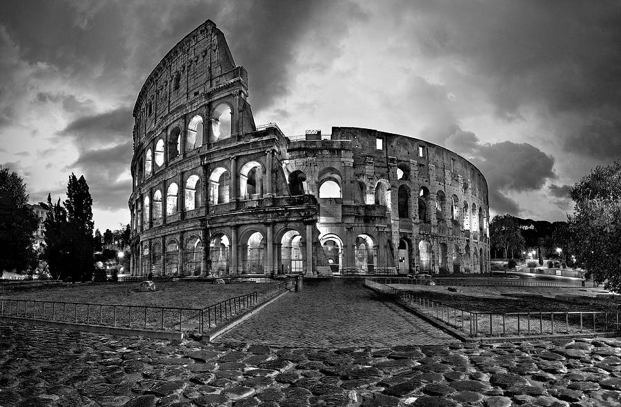 Black And White Photograph - Rainwashed Coloseum at Dawn #1 by John Bartosik
