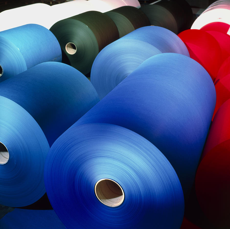 Paper Roll Photograph - Rolls Of Coloured Paper At A Paper Mill #1 by Colin Cuthbert