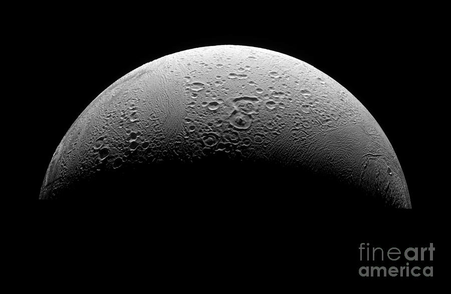 Black And White Photograph - Saturns Moon Enceladus #1 by Stocktrek Images