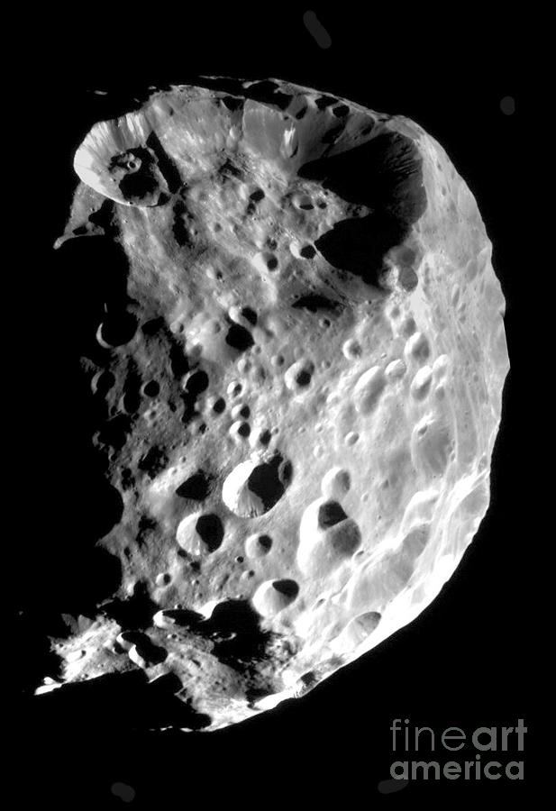 Saturns Moon Phoebe Photograph by NASA Science Source