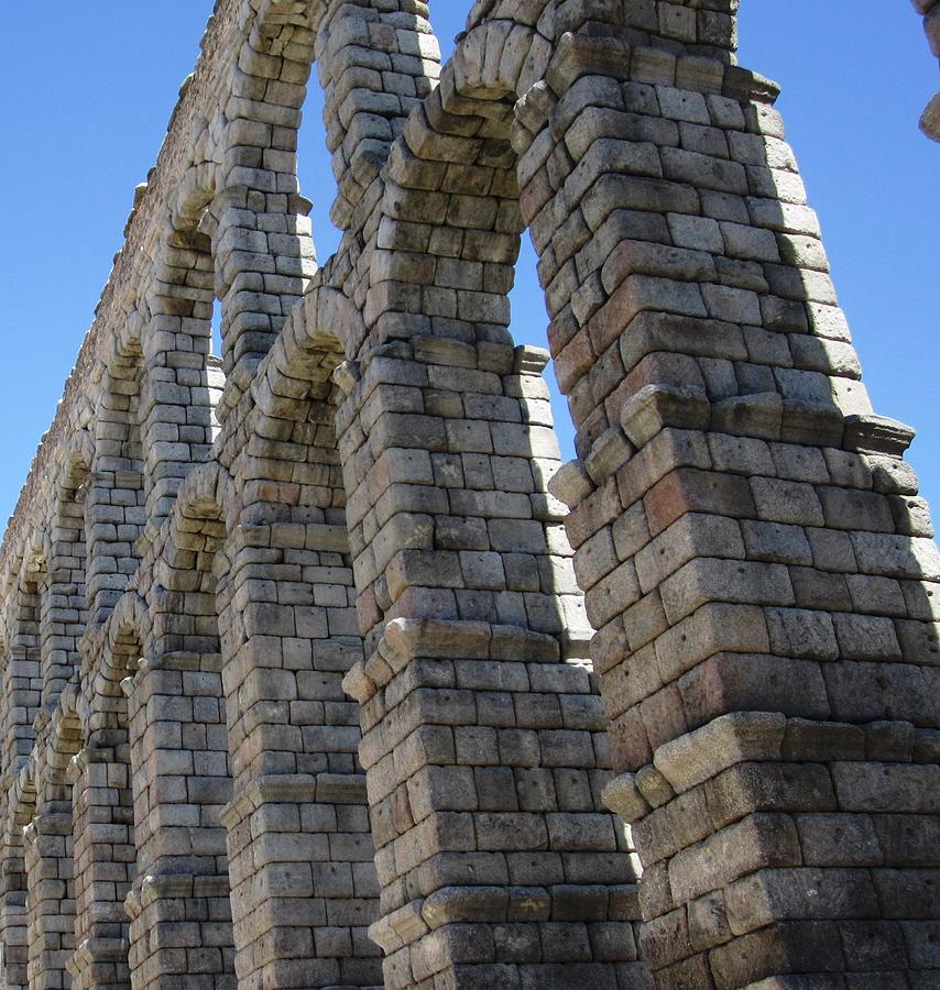 Segovia Ancient Roman Aqueduct Architectural Granite Stone Structure V With Arches in Spain #1 Photograph by John Shiron