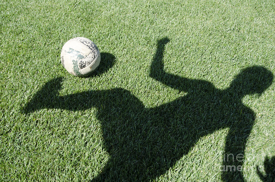 Football Photograph - Shadow playing football #1 by Mats Silvan