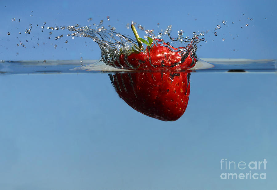 Strawberry Dropped Into Water #1 Photograph by Ted Kinsman