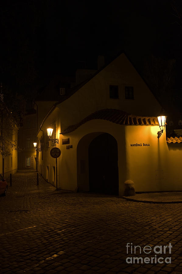 Street in Prague by night #1 Photograph by Jorgen Norgaard