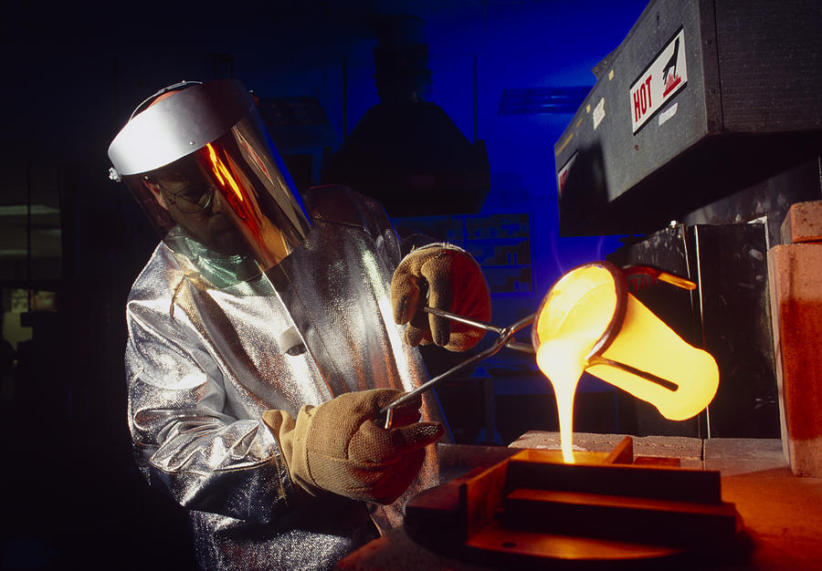 Furnace Photograph - Technician Pours Molten Glass From A Crucible #1 by Volker Steger