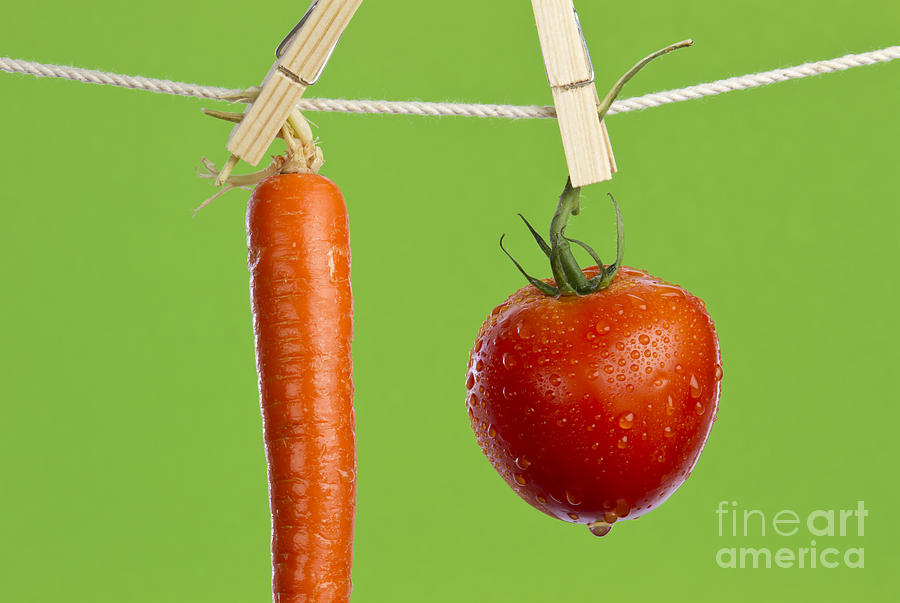 Tomato Photograph - Tomato and carrot #1 by Blink Images