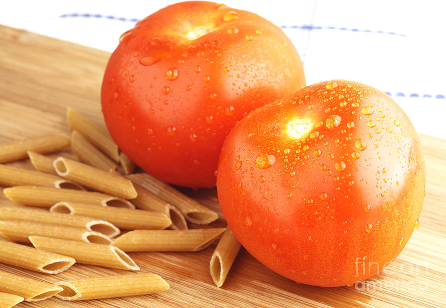 Tomato Photograph - Tomatoes and pasta #1 by Blink Images