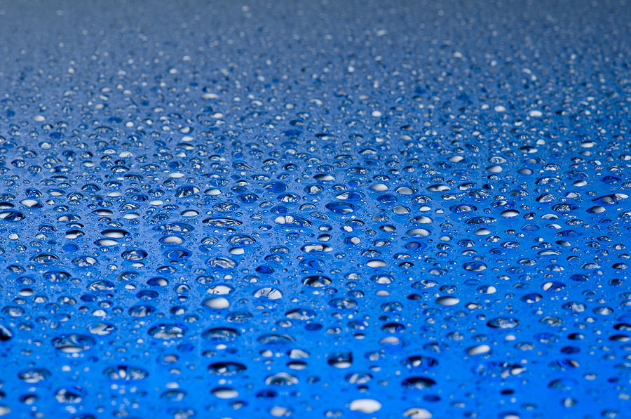 Water drops on a shiny surface #1 Photograph by U Schade