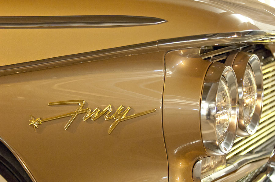 1960 Plymouth Fury Convertible Headlight Emblem Photograph by Jill Reger