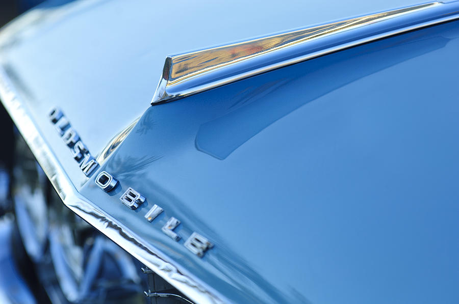1962 Oldsmobile Hood Ornament and Emblem Photograph by Jill Reger