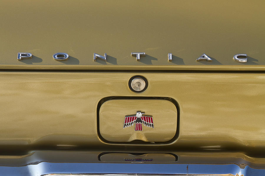 1967 Bronze Pontiac Firebird Back Emblem Photograph by James BO Insogna