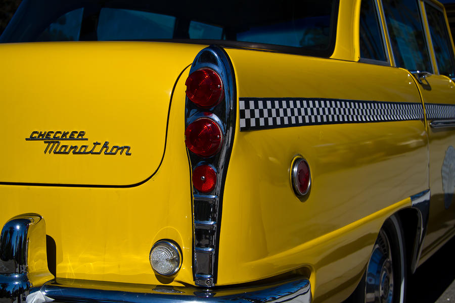 1971 Checker Cab Photograph by Roger Mullenhour