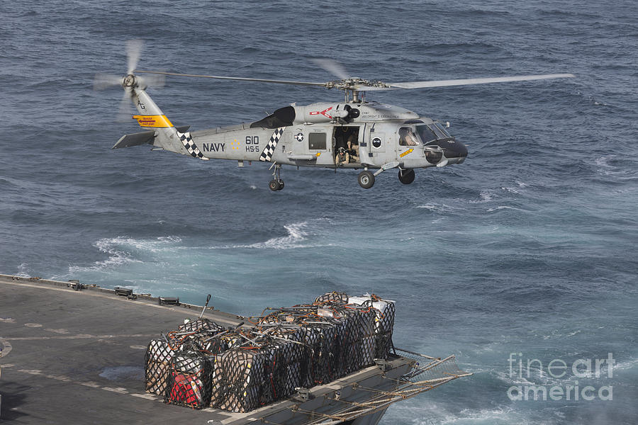 A Sh 60j Seahawk Conducts A Vertical Photograph By Gert Kromhout Fine Art America