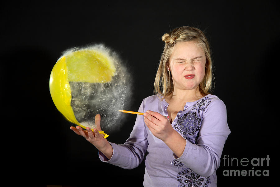 Girl Popping A Balloon Photograph by Ted Kinsman