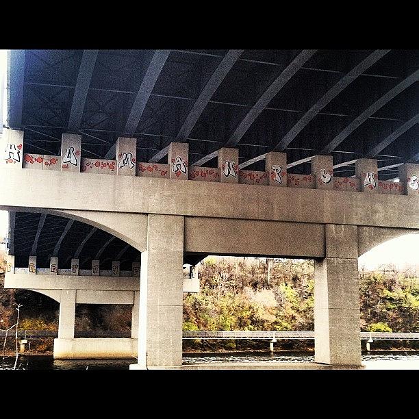 Minneapolis Photograph - 2 Huge Pieces Under The Bridge by Vik Vaughn