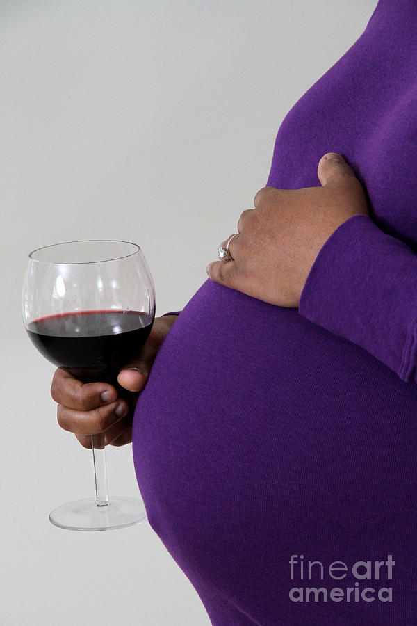 Pregnant Woman Drinking Wine Photograph by Photo Researchers