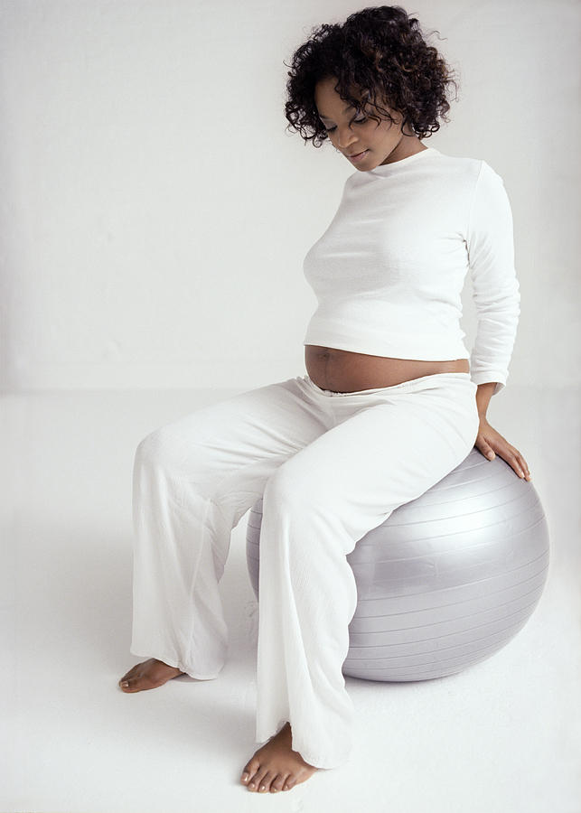 Pregnant Woman With Birthing Ball Photograph By Ian Boddy Fine Art America