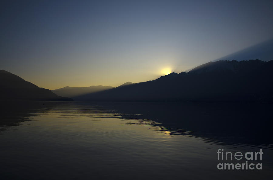 Sunset over an alpine lake #2 Photograph by Mats Silvan