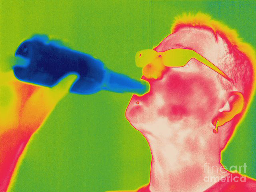 Thermogram Of A Man Drinking #2 Photograph by Ted Kinsman
