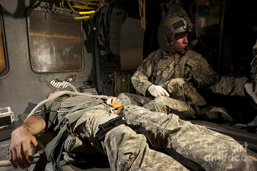 U.s. Army Specialist Practices Giving Photograph by Terry Moore