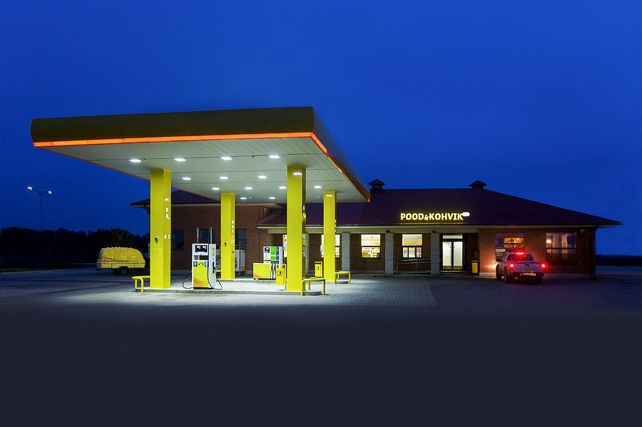 A Roadside Garage At Night. Yellow Photograph by Jaak Nilson - Fine Art ...