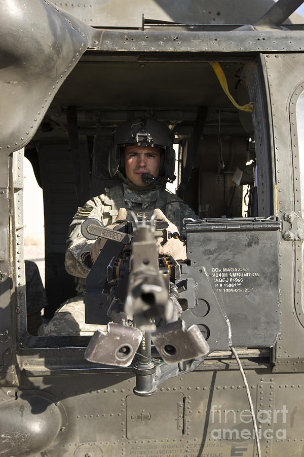A Uh 60 Black Hawk Door Gunner Manning Photograph By Terry Moore