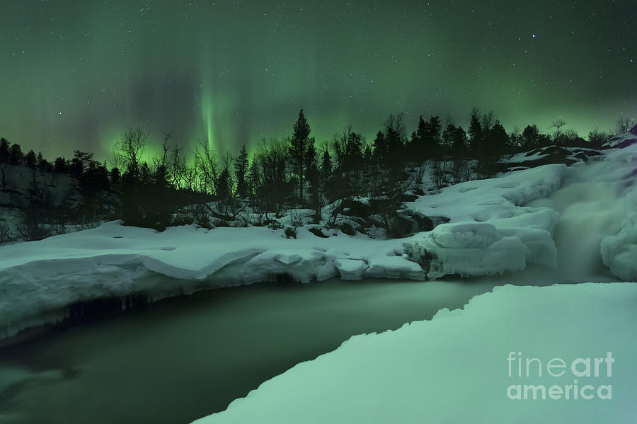 A Wintery Waterfall And Aurora Borealis Photograph